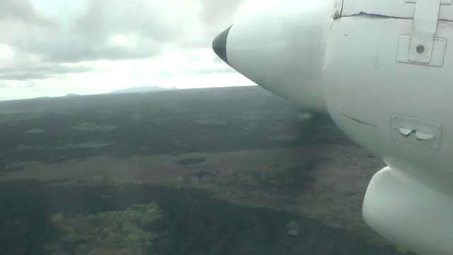 Inter-island flight from Isla Isabela to Isla Baltra in Galapagos Islands